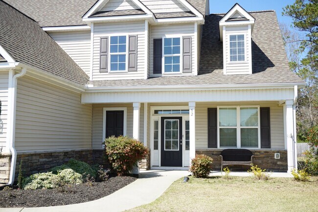 Building Photo - This lovely 4BR/2.5BA is located off Sloop...