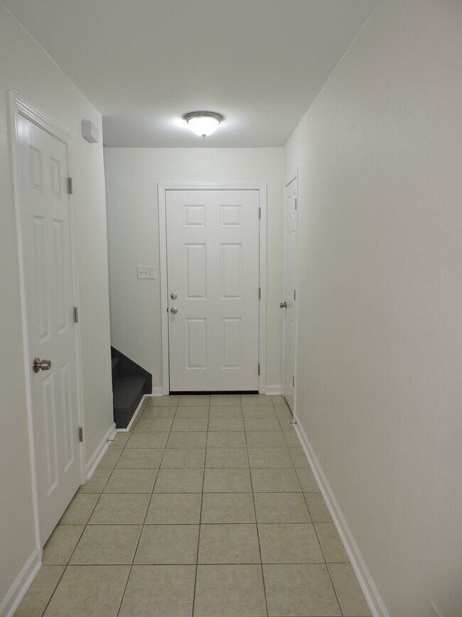 Building Photo - Updated townhouse - just minutes to NAS Pe...