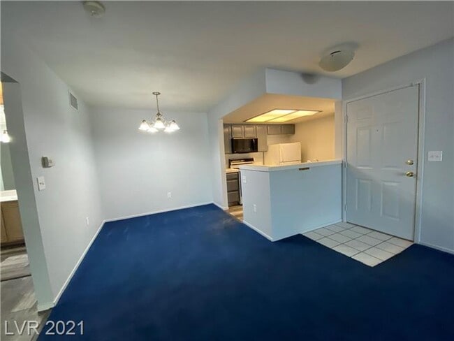 Building Photo - Cozy 1-Bed Condo in Gated 89128 Community ...
