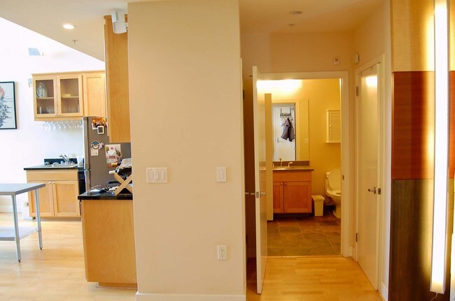 Building Photo - Designer Loft with Roof Deck and City Views