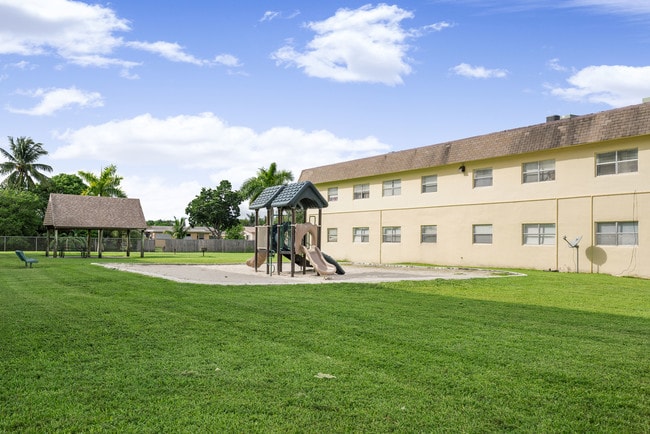 Playground & BBQ area - Canterbury Palms Apartments