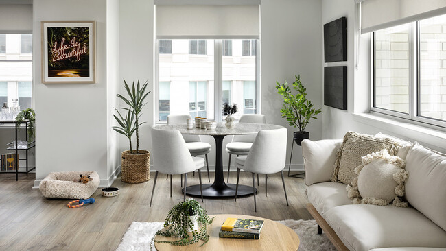 Apartment Living Room with wood floors. - Griffis LoDo