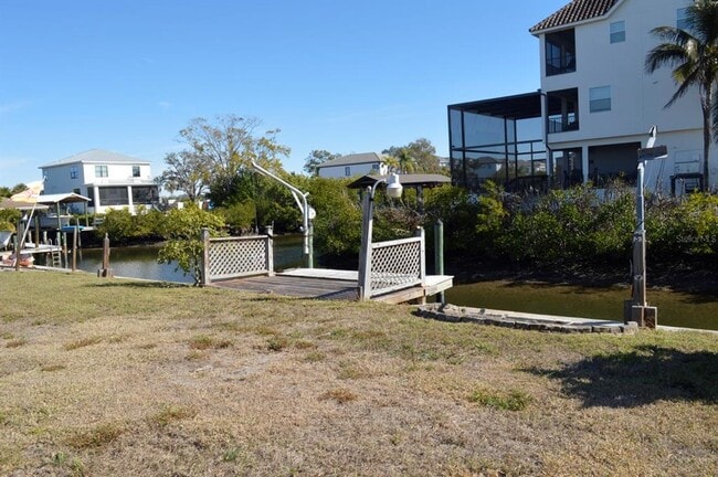 Building Photo - 6525 Manila Palm Way