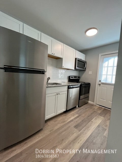 Foto principal - Updated 1 bed Near Downtown in a Neighborh...