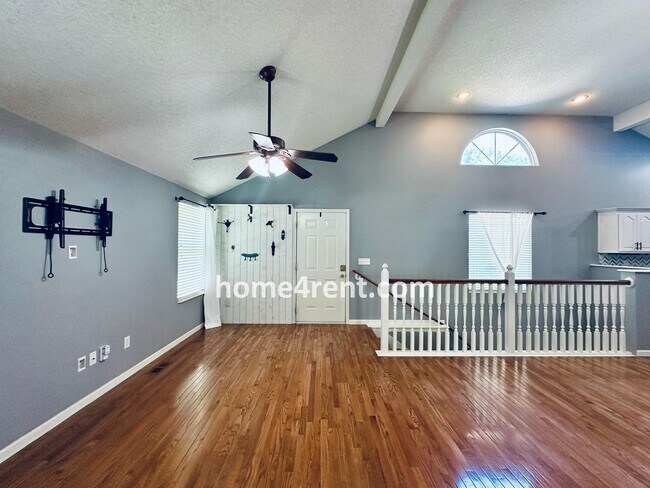 Building Photo - Overland Park Raised Ranch, Primary Suite on the Main Level, Updated Kitchen and Fenced Yard!