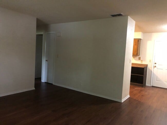 Building Photo - SPACIOUS 3BR/1.5BA w/Carport, Beautiful Wood Finish Flooring, Privacy Fenced Backyard! NO APP FEE!