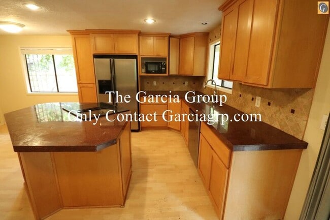Building Photo - 9585 SW New Forest Dr