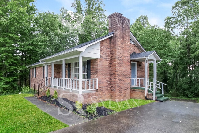 Photo - Enjoy living the good life in this 4 BR, 3 BA brick rancher House