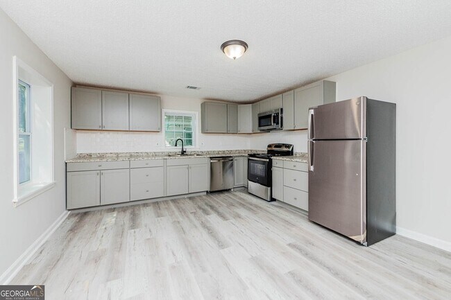 Foto del edificio - 3584 Log Cabin Dr