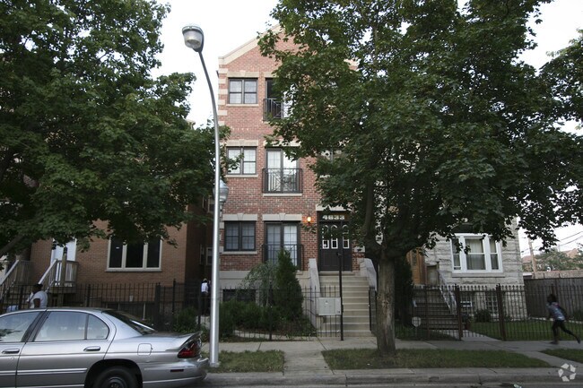Building Photo - 4633 S Langley Ave