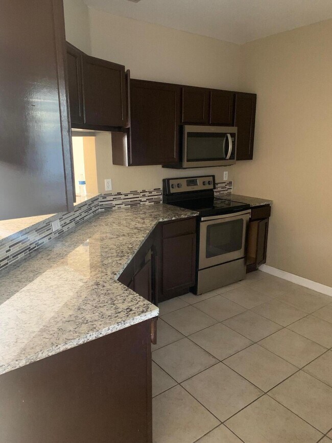Building Photo - 1165 Colonial Palms Way