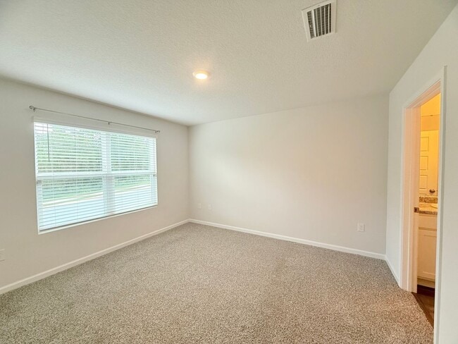Foto del edificio - Modern 3-Bedroom Home in Bridlewood