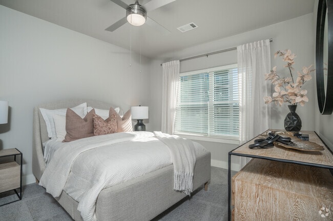 2BR, 2BA - 1,118SF - Primary Bedroom - The Delaney at East Park