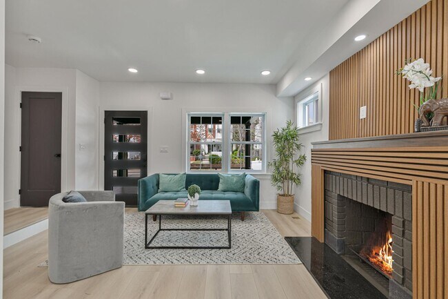 Building Photo - Tudor Duplex w/ 3 Parking Spaces + EV Charging and Garage