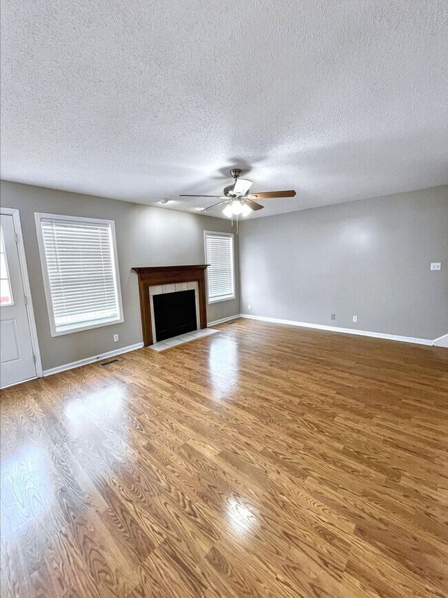 Building Photo - Spacious 3-Bedroom Home with Deck, Firepla...