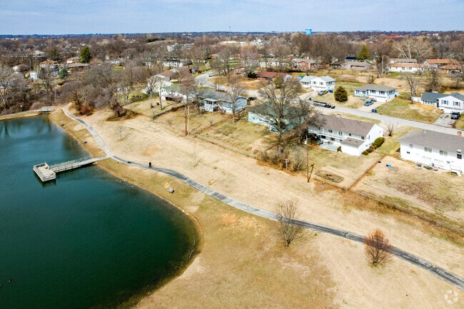 Enjoy walking along Hamilton Hills Lake.