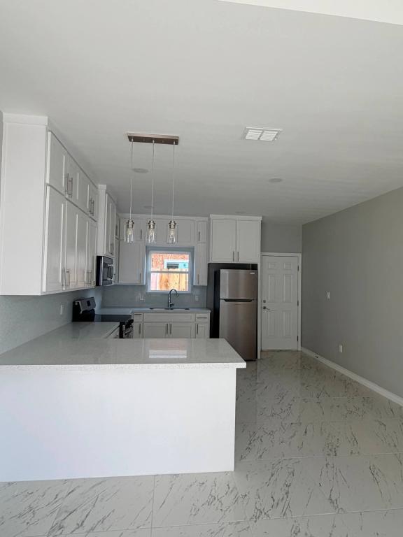 Foto del edificio - 3806 Rosewood Ln