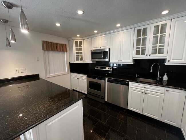 Building Photo - Available Now! 2-Bedroom, 2-Bath Condo in ...