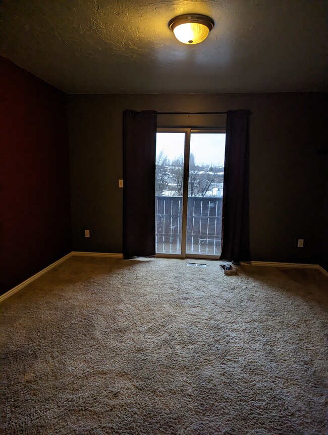 Bedroom with Balcony - 729 W Jefferson Ln