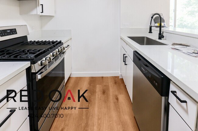 Building Photo - Two Bedroom with Stainless Steel Appliance...