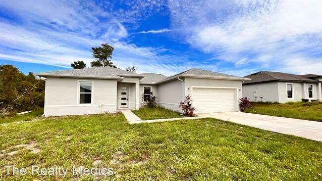 Building Photo - 4 br, 2 bath House - 9 Orchid Ln