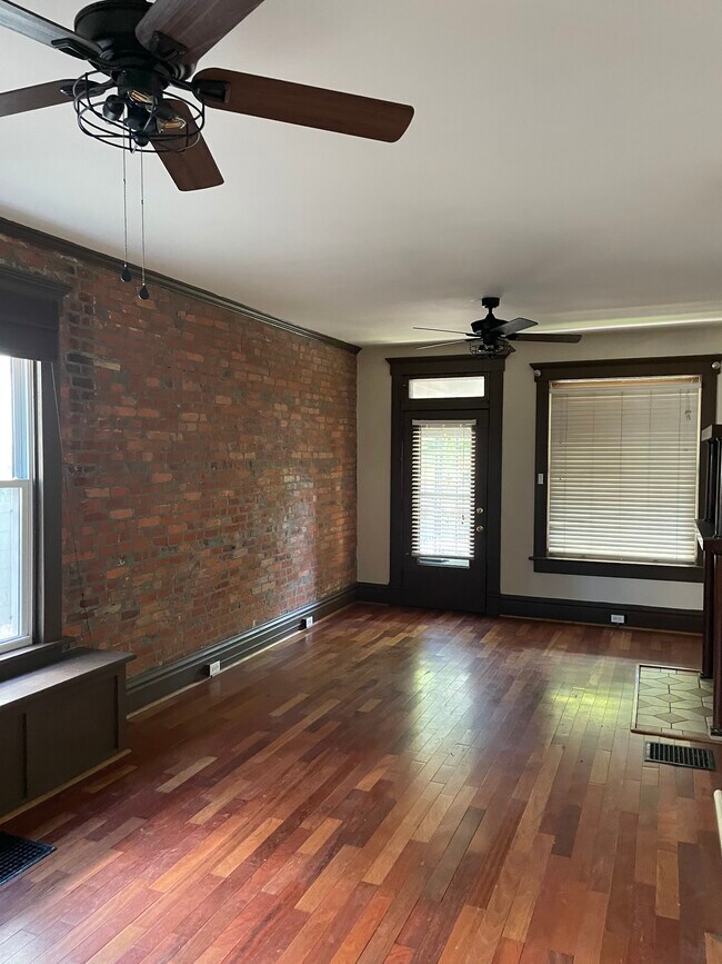 Living room with exposed brick - 254 Thurman Ave