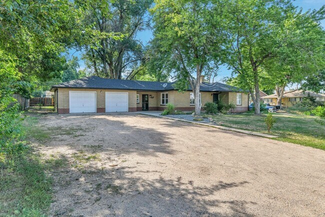 Photo - .31 acre corner lot and huge garage + upda... House