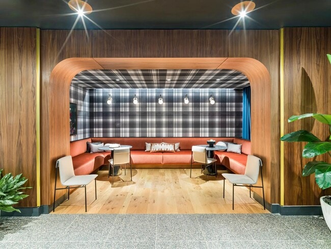 Eclectic lounge spaces with retro flair, perfect for casual hangs or one-on-one convos. - Modera SoBro