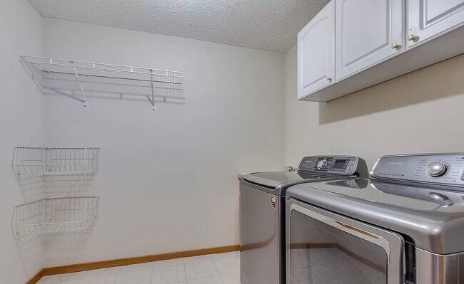 Building Photo - 2716 92nd Cres N