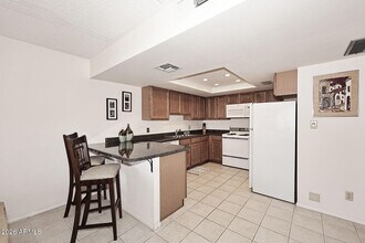 Building Photo - 7910 E Camelback Rd