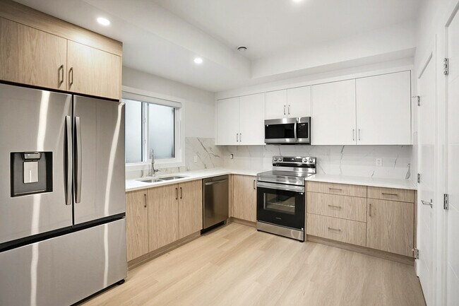 Building Photo - 6123-6133 33 Ave NW