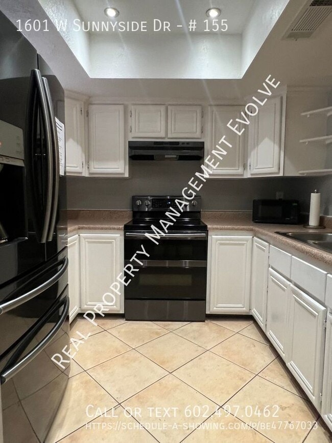 Building Photo - Cozy Phoenix Condo *MOVE-IN SPECIAL: 2 WEE...