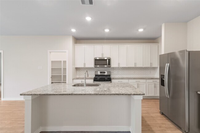 Foto del edificio - 5811 Quest Valley Dr