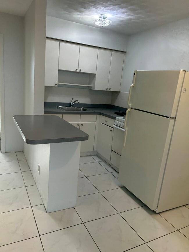 Photo - 1408 NE 6th St Apartment