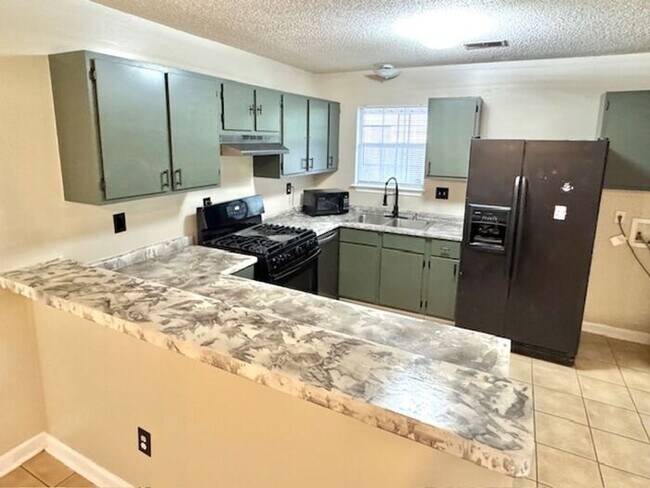 Foto del edificio - Affordable 3BR home in Southaven with grea...