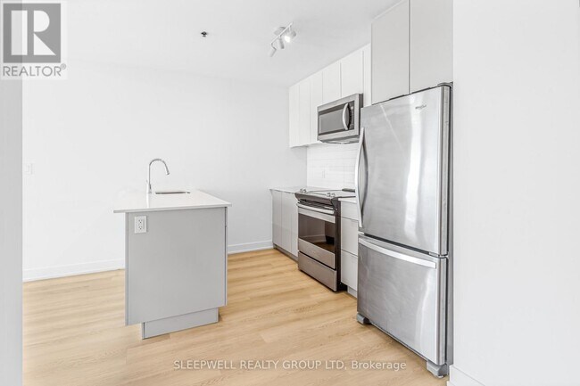 Building Photo - 1354 Carling Ave