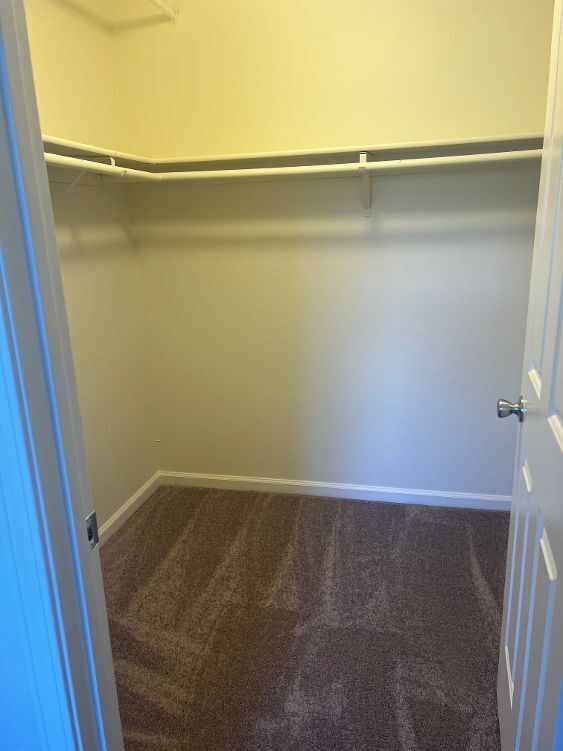 Walk in closet in master bedroom - 3268 Joshuapark Dr