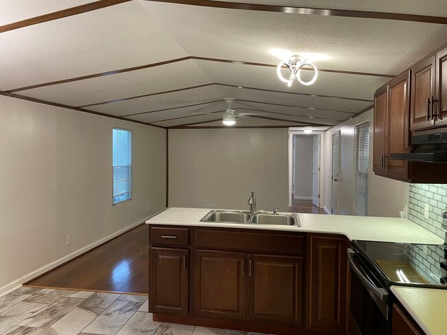 Building Photo - Updated Two Bedroom Trailer with Lake Acce...