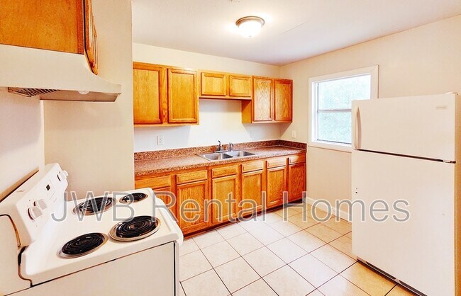 Building Photo - 8038 Banville Dr