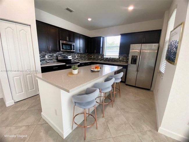 Foto del edificio - 7879 NW Greenbank Cir