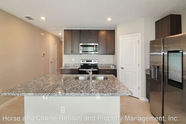 Building Photo - 3 br, 2.5 bath House - 17047 Coral Key Dr
