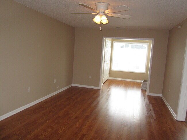 Common area with laminate flooring - 2010 Wolfmill Dr