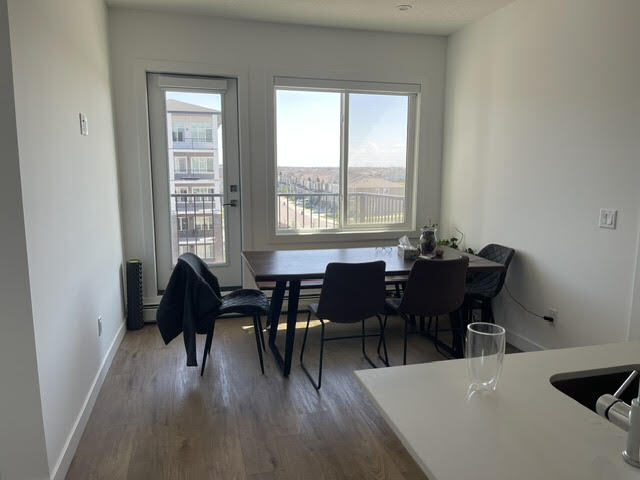 Building Photo - Modern 2 Bedroom + Den Condo with Underground Parking in Skyview Ranch (IP054)