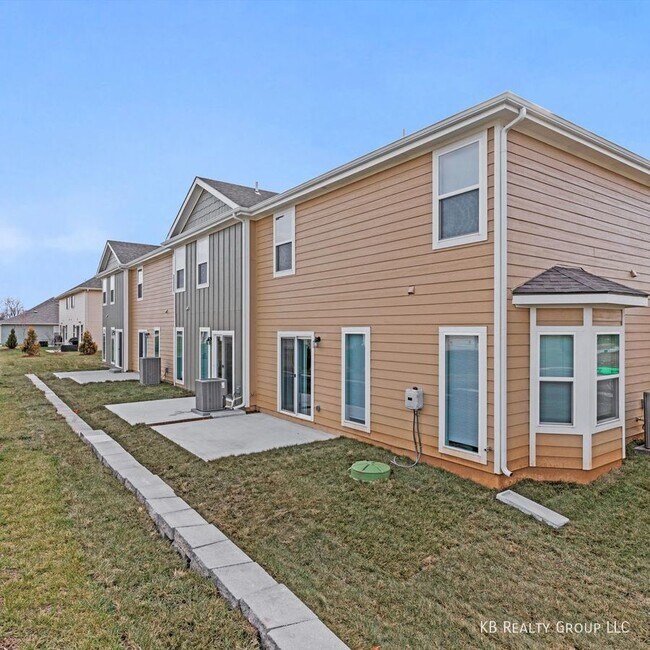 Building Photo - Brand New 3 Bed 2 Car End Unit Townhome in...