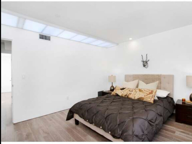 Upstairs bedroom2. Lots of natural light with skylight and windows. - 2730 Auburn Street