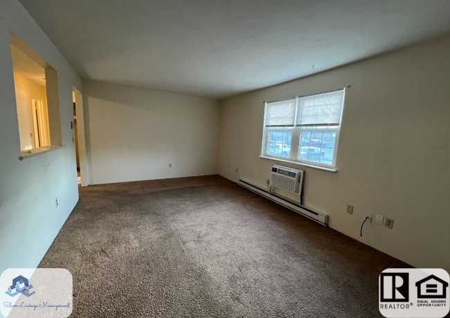 Building Photo - Charming One-Bedroom Condo with Bonus Room...