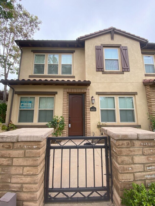 Primary Photo - Move-in Ready Townhome in Parklike Community