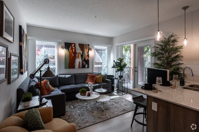 2BR, 2BA - 877SF - Living Room - Abbey Park Residences