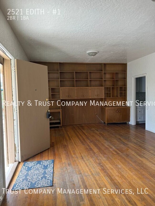 Building Photo - Welcome to our charming 2-bedroom, 1-bathr...