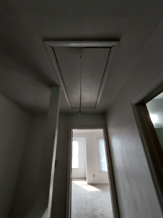 attic with landing - 2026 Elmhurst Ln